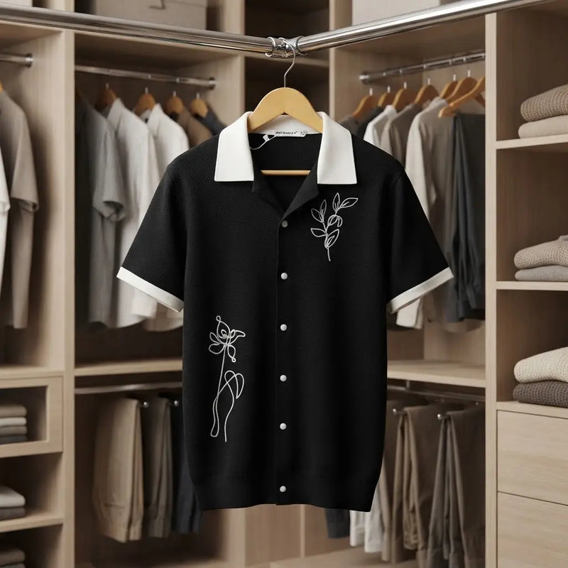 Black Short-Sleeve Knit Cuban Collar Shirt with White Contrast Trim and Line-Art Floral Embroidery
