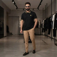 Men's Black Greek Key Trim Polo Shirt with Gold Crest Embroidery view 2